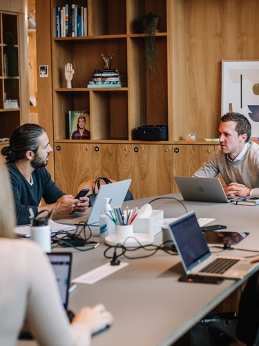 Sharp & Carter Specialist Recruitment, Contact Us, Male Co-Workers Talking