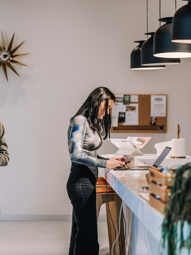 Sharp & Carter Specialist Recruitment, Our Sectors, Female Consultants Talking on the Phone